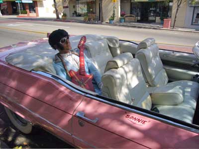 Elvis in a pink Cadillac